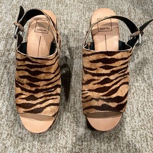 Tiger fur Dolce Vita platform open toe sling backs.